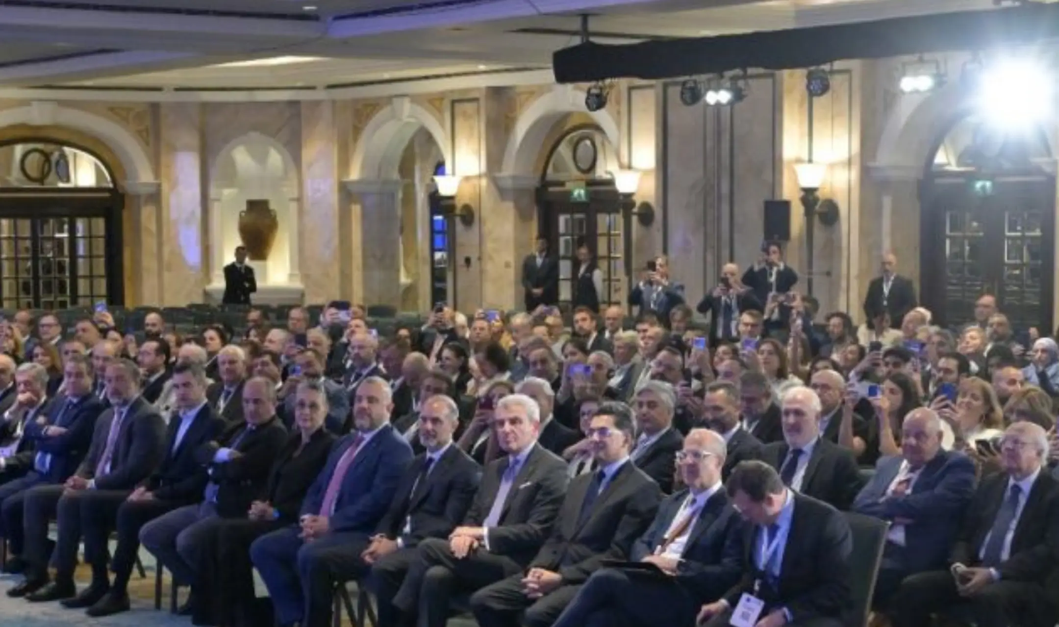 Audience of officials and delegates attending a government conference in Lebanon